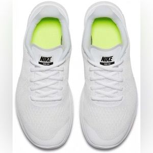 Girls or Boys all white Nike sneakers